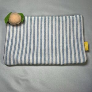 Ipsy blue & white pinstripe Glam Bag w/peach pom-pom zipper pull